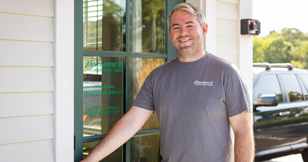 smiling Densmore employee